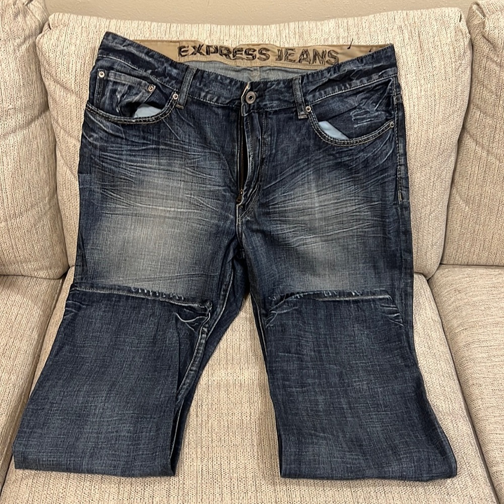 Men’s Express classic low rise boot cut blue jeans.